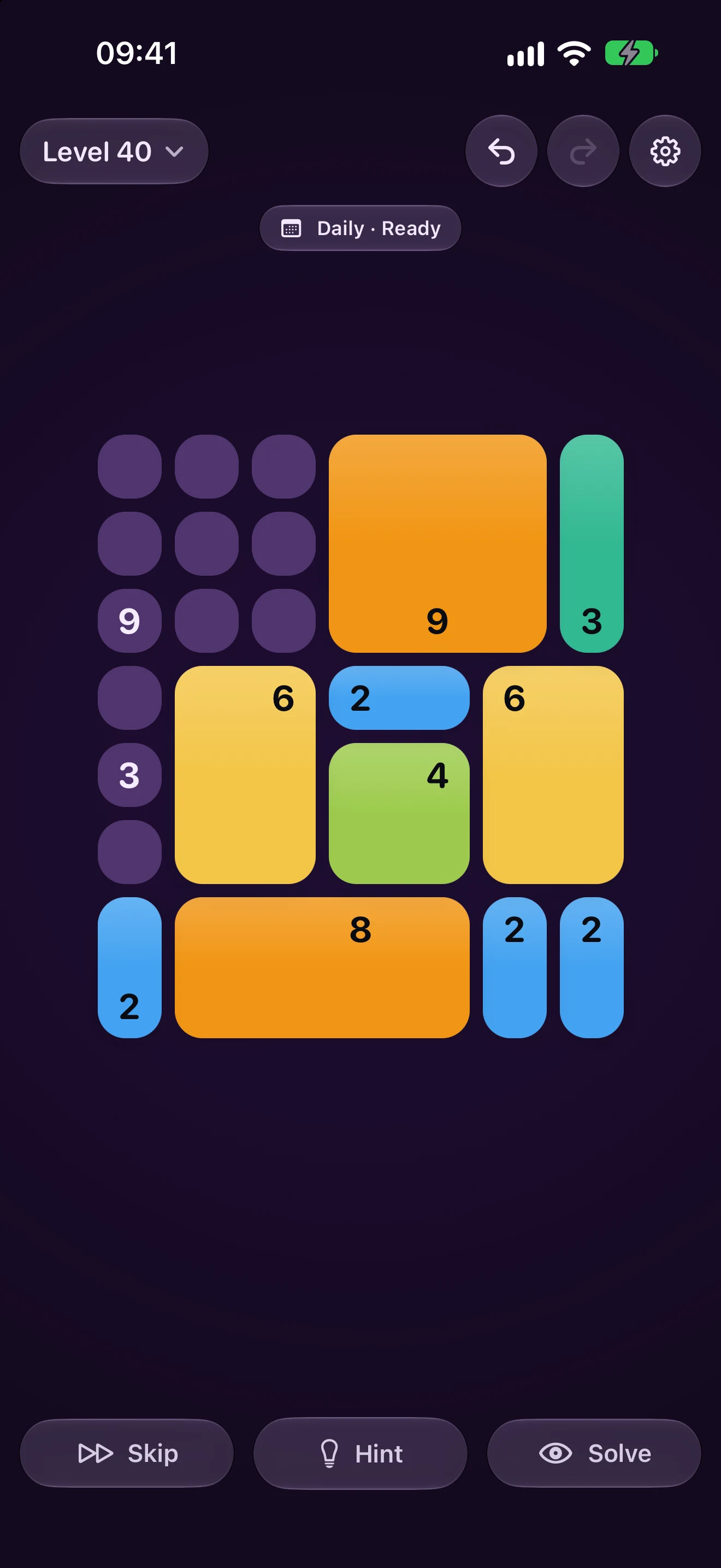 A five by four board in the Bloom theme on iPhone in dark mode, part way through: mauve empty cells with their numbers still waiting, and pieces laid over them — two tall lime pieces, a teal one, and a blue two-cell piece along the bottom row. Glass undo, redo and settings buttons sit above the board, and Skip and Hint capsules below it.